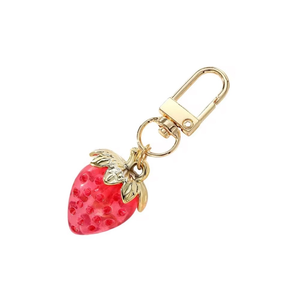 Strawberry keychain and lip oil plumper